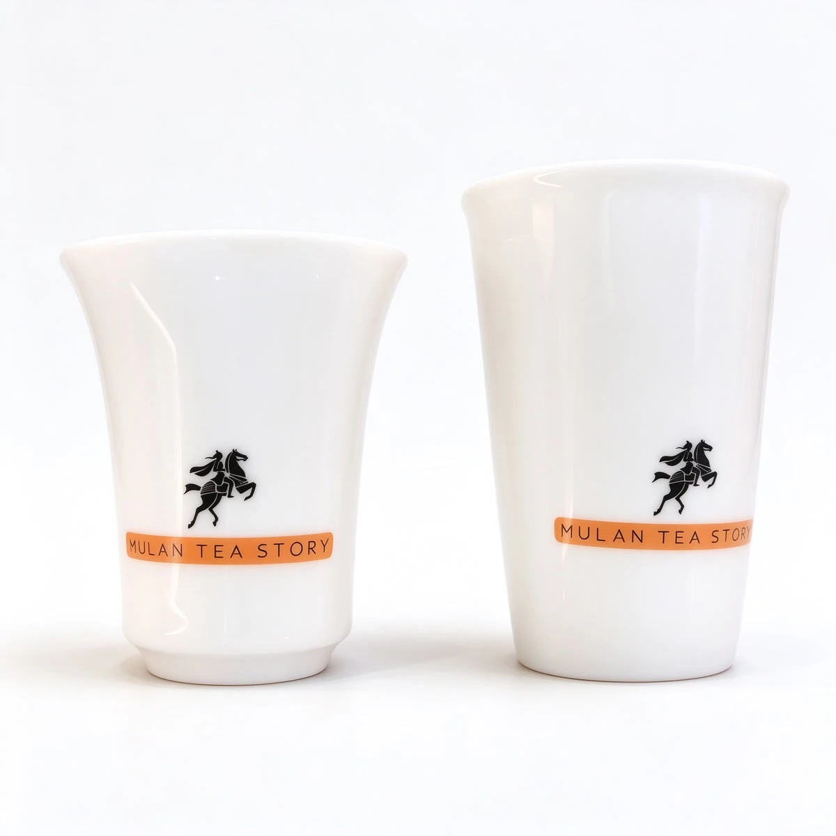 The Yu-Man pair of cups — a larger and a smaller cup, paired